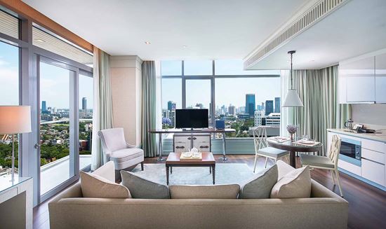 Separate living and dining room in One Bedroom Corner Suite